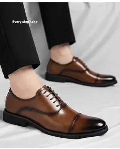 Detailed view of brown three-joint Oxford leather shoes for formal business attire.