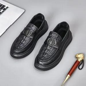 Elegant black crocodile-textured leather loafers with stylish hollow-out design for men