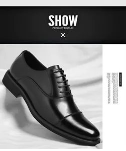 Close-up of black leather oxford shoe with cap toe detail for business formal wear