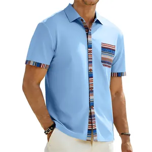 Detailed view of men's blue bohemian short sleeve shirt with striped color block accents