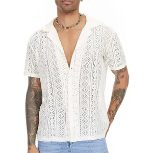 Detailed view of a men's white hollow out lace short sleeve shirt with lapel collar style