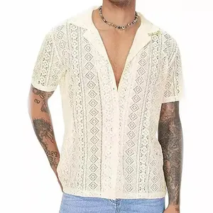 Close-up of men's cream lace hollow shirt featuring intricate geometric patterns and lapel