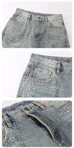 Close-up of rhinestone detailing on light blue straight-leg denim jeans for men.
