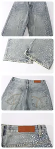 Detailed view of men's loose straight denim jeans featuring sparkling rhinestone patterns.