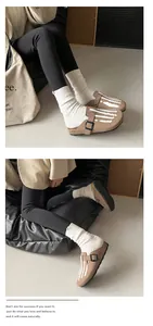 Fashionable suede platform clogs featuring unique skeleton hand print and adjustable buckle
