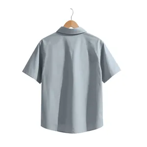 Back view of men's light blue short sleeve business casual woven shirt on hanger