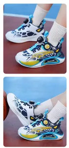 Detailed view of kids sports shoes with breathable mesh and rotary buckle system