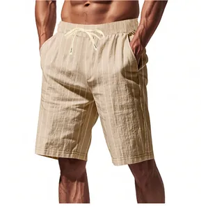 Macro view of men's linen shorts featuring white vertical stripes and drawstring waist