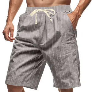 Men's loose grey linen beach shorts with vertical stripes and adjustable drawstring waist