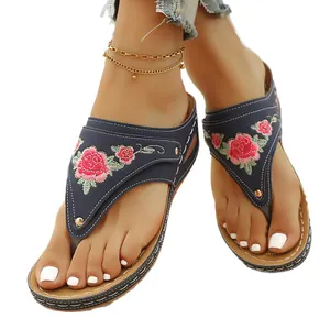 Stylish bohemian floral embroidered thong sandals featuring comfortable platform soles