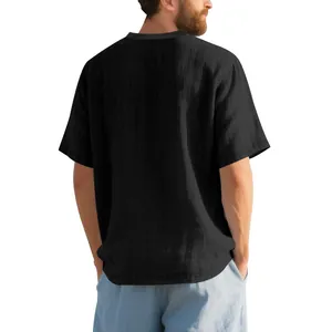 Detailed back view of a men's black t-shirt featuring slub linen texture and loose fit