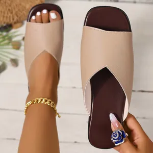 Detail view of French V-neck leather flat sandals featuring a chic square toe and open-toe style
