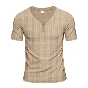 Detailed view of the textured breathable fabric on a men's khaki Henley T-shirt