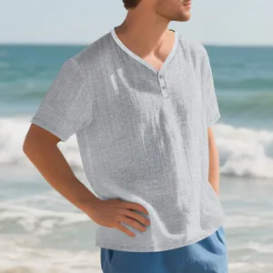 Men's casual gray imitation linen short sleeve Henley shirt in a beach setting