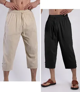 Detailed view of men's breathable cotton linen cropped pants in beige and black colors.