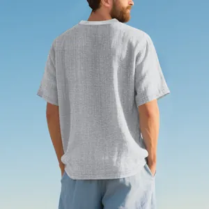 Close-up back view of men's casual gray textured slub linen-like short sleeve t-shirt