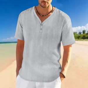 Close-up of a men's grey Henley shirt featuring a breathable linen-like slub texture