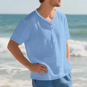 Close-up of men's light blue Henley T-shirt with breathable linen-like texture