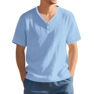 Detail showing the fit and breathable slub texture of this light blue men's Henley shirt