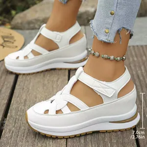Stylish women's white platform wedge sandals featuring Roman cage straps and 7cm heel height