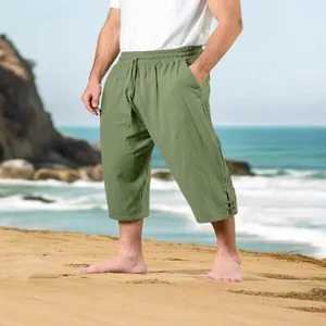 Breathable green cotton linen cropped trousers for men featuring a drawstring waist beach style