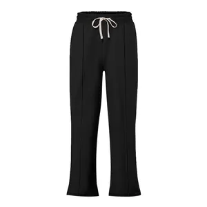 Black high-street men's flared sweatpants with drawstring waist and seam detail