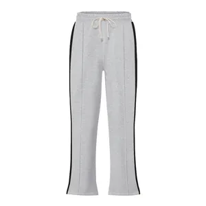Stylish grey men's flare sweatpants with black side stripes and drawstring waist