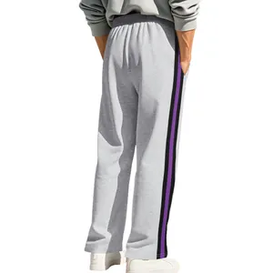 Back view of grey men's flared sweatpants featuring purple and black side stripes