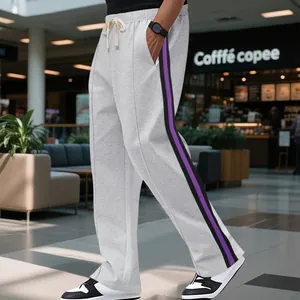 High-street men's light grey flared sweatpants featuring purple side stripes and drawstring
