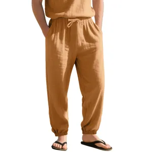 Detail shot of men's loose linen jogger pants featuring a comfortable drawstring waist