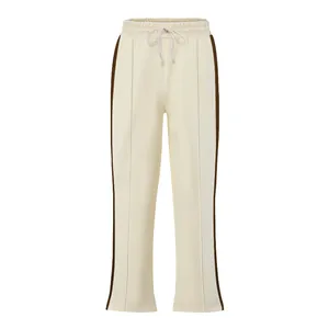 Detailed front view of high street off-white men's side-striped flare sports trousers