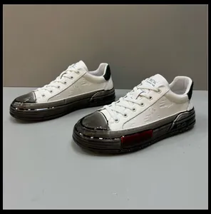 Detailed side view of stylish men's casual white sneakers with thick platform soles