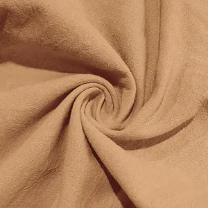 Close-up macro view of the breathable and soft linen fabric texture for men's pants