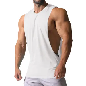 Close-up detail of white men's gym tank top featuring deep side split for breathability