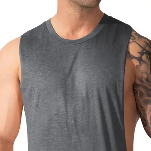 Close-up of men's dark grey fitness tank top with wide armholes and breathable fabric