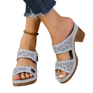 Stylish women's grey laser-cut heart pattern platform mules with chunky block heels