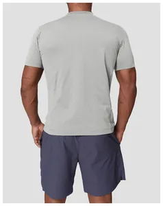 Back view of a grey quick-dry cooling athletic T-shirt designed for men's outdoor activities