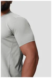 Detailed close-up view of a gray quick-dry athletic T-shirt sleeve showing fabric texture