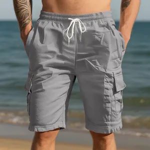 Dettaglio pantaloncini cargo mare in lino grigio da uomo con coulisse e tasche laterali
