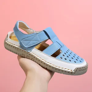 Breathable women's hollow closed-toe sandals featuring a stylish blue and white color block