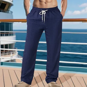Pantalon de plage bleu pour hommes, texture lin, motif à carreaux et cordon de serrage