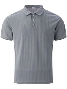 Detailed view of gray knitted polo shirt featuring a fine checkered texture and buttons. (86 chars)