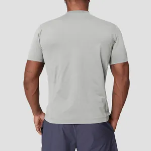 Back view of men's grey quick-dry athletic T-shirt for outdoor sports and hiking.