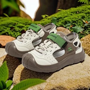 Boys closed-toe sports sandals with breathable mesh and green Velcro straps for summer.