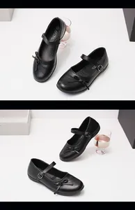 Detailed close-up view of girls vintage black Mary Jane flat shoes with elegant bow detail