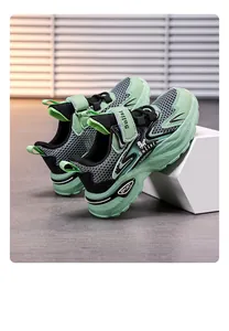 Close-up detail of breathable green and black mesh boys sports sneakers for active kids