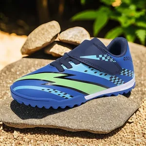 Chaussures de football bleues pour enfants avec fermeture velcro et motif éclair