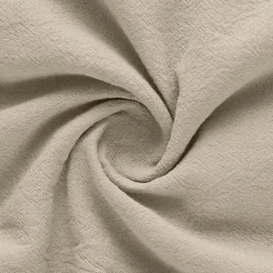 Close-up view showing the breathable light beige linen fabric texture of a casual shirt