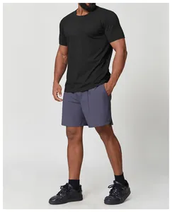 Full view of men's black quick-dry sports T-shirt for gym, tennis, and hiking activities.