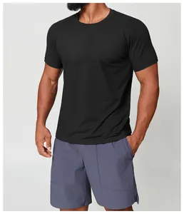 Close-up of a men's athletic quick-dry black crew neck T-shirt on a fitness model.